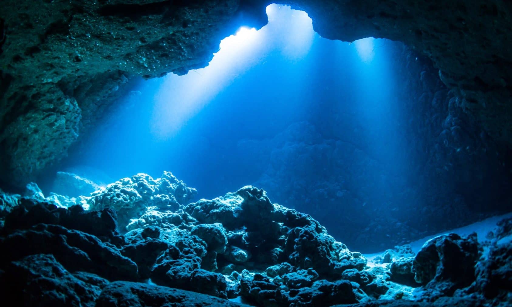 Sun Light into the Underwater Cave Visiting caves